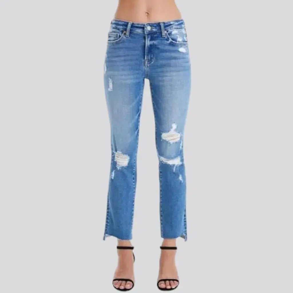 Distressed ankle-length jeans