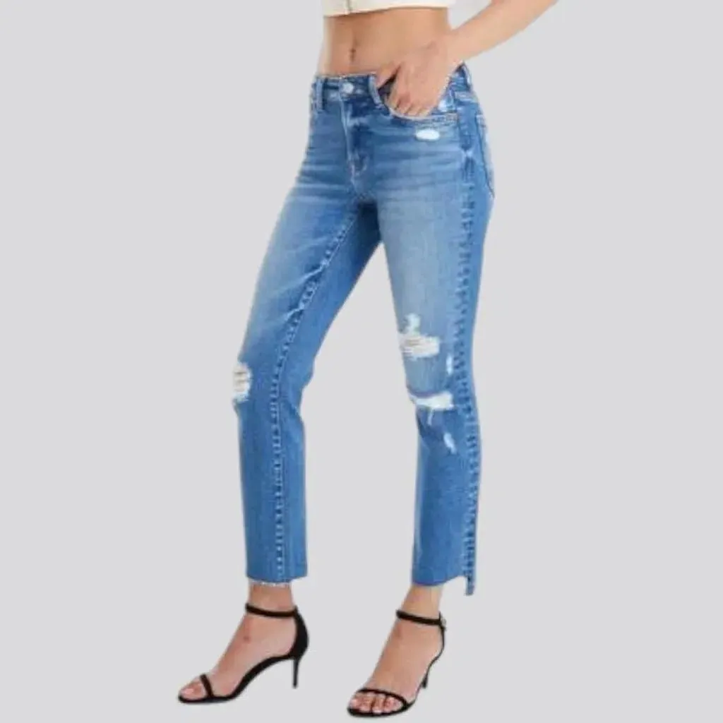 Distressed ankle-length jeans