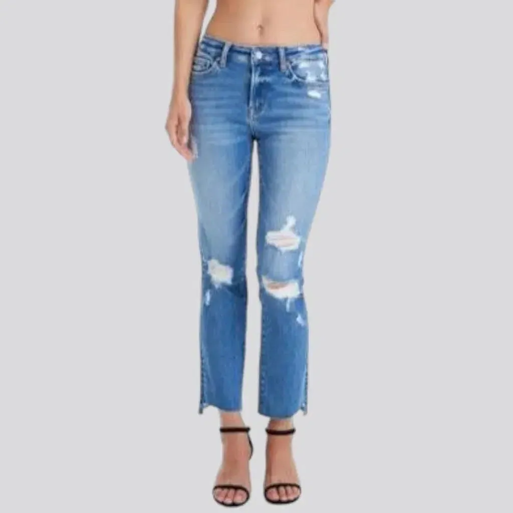 Distressed ankle-length jeans