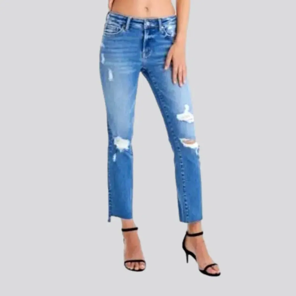 Distressed ankle-length jeans