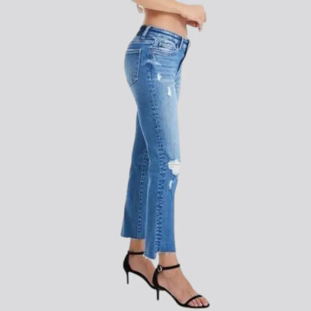 Distressed ankle-length jeans